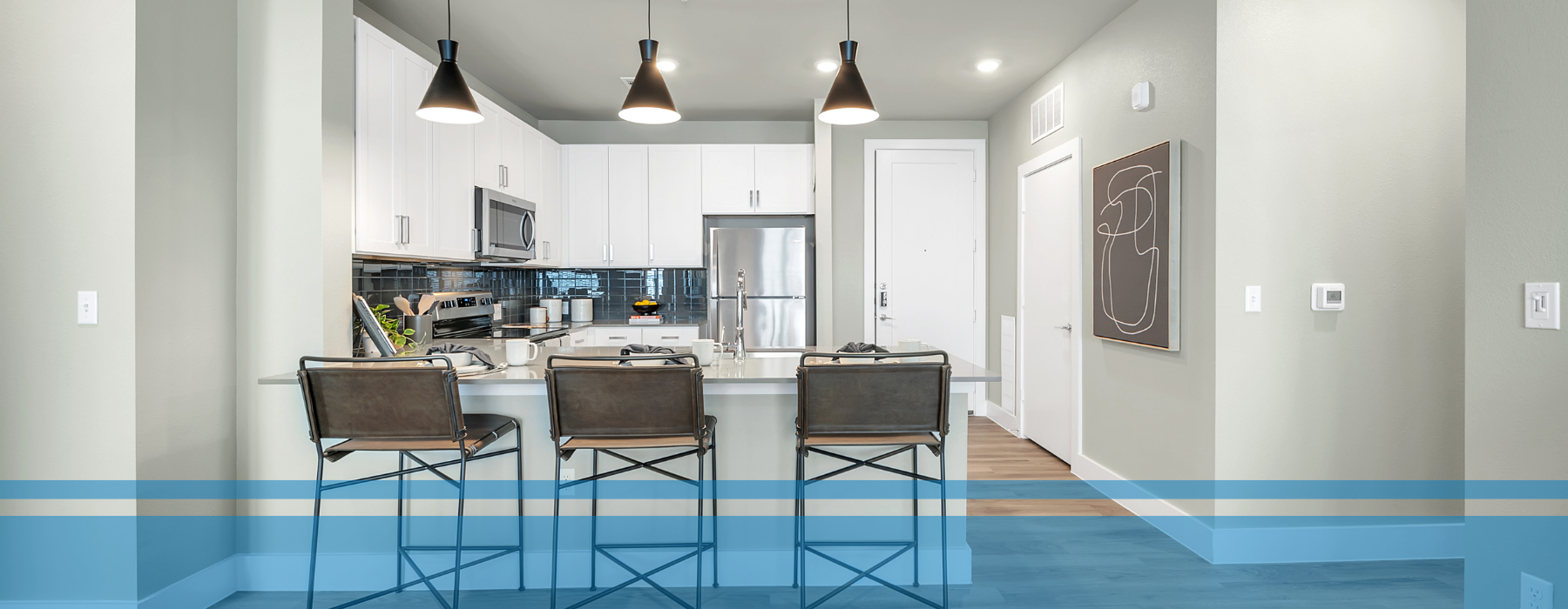 White kitchen in East Austin apartment