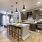 Urban East Apartment kitchen with dark cabinets