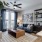 living room with a couch coffee table and large window